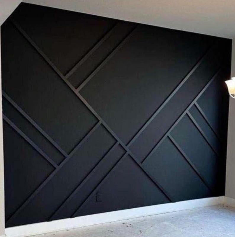 Custom geometric accent wall with black trim